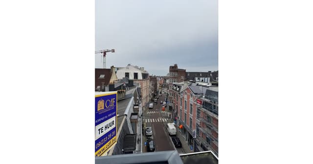 Leuke penthouse met ruim terras en veranda in het hart van Gent